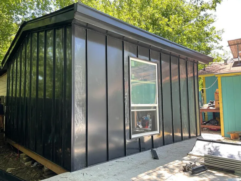 Black standing seam metal wall panels for Metal Roof Installation in Surfside