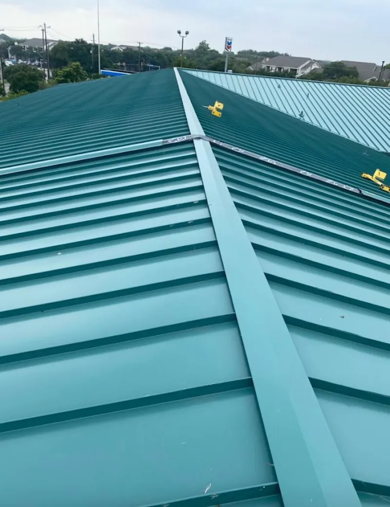 Green commercial metal roof ridge and valley for Metal Roof Repair in Surfside
